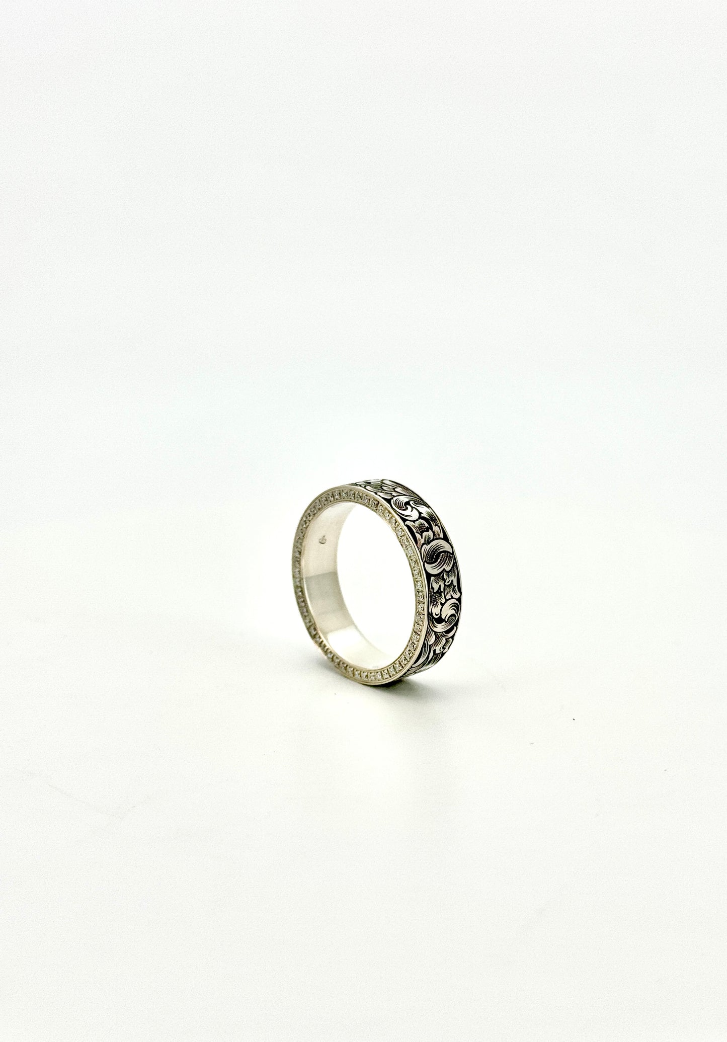Diamond accented wedding band (size 10)
